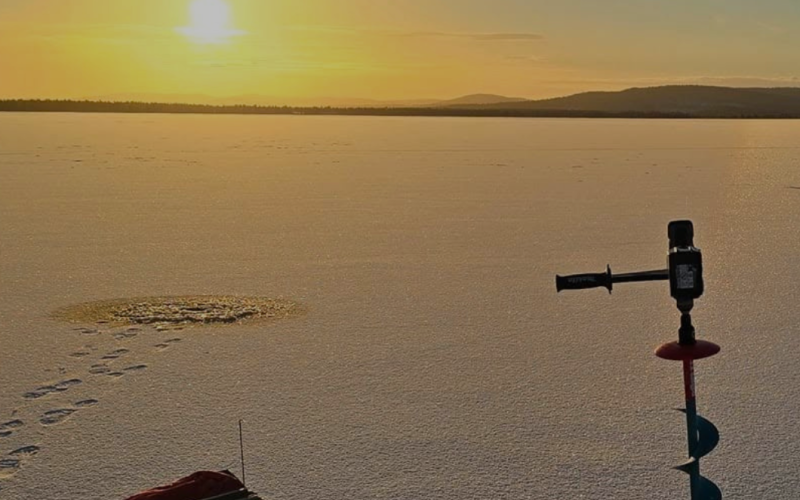 WINTER FISHING BY SNOWMOBILE- Inari